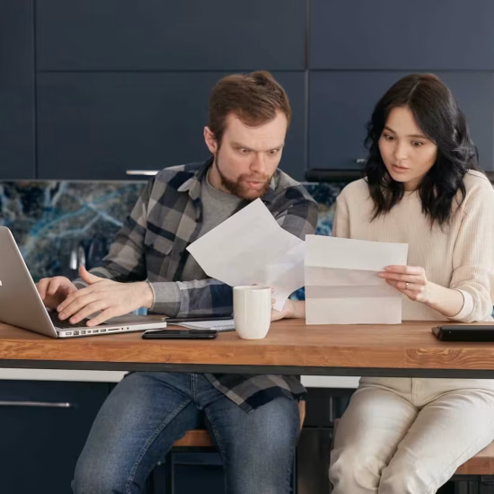 a man and a woman looking surprised