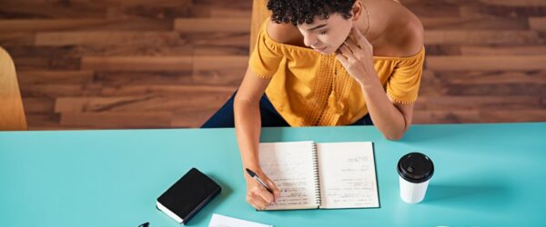 College student copying notes