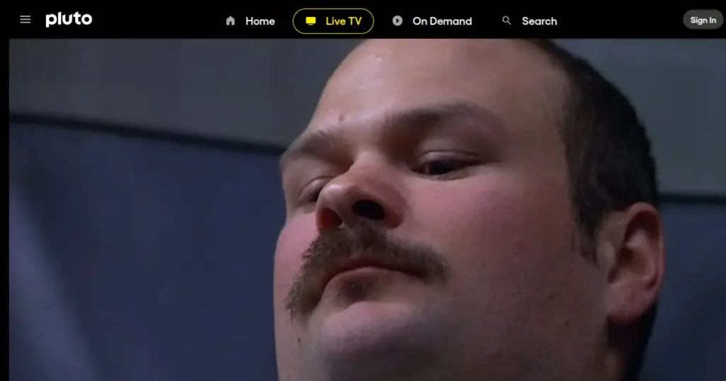 Pluto TV live streaming interface with channel guide and on-demand content