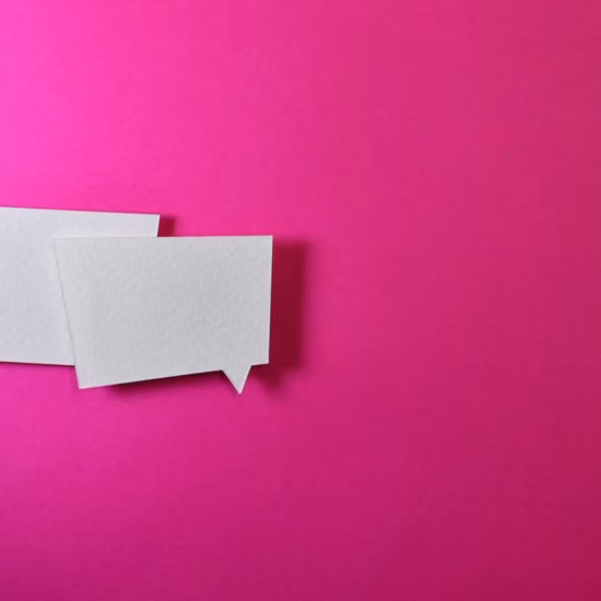 two white message balloons