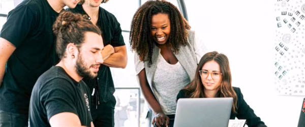 man in black crew neck t shirt sitting beside woman in gray crew neck t shirt