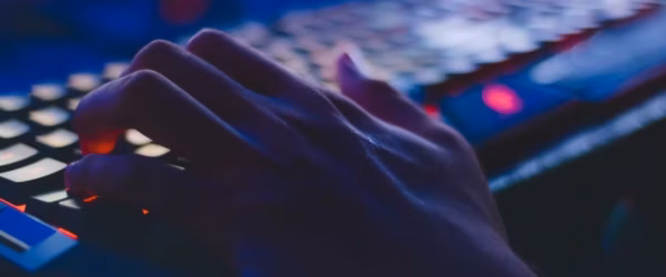 photo of person typing on computer keyboard