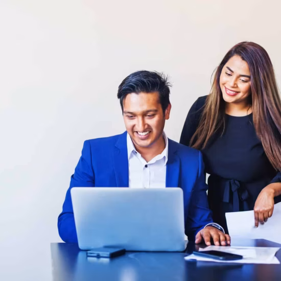 two indian colleagues working project