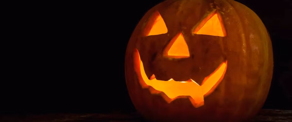 halloween-pumpkin-head-jack-lantern-wooden-background