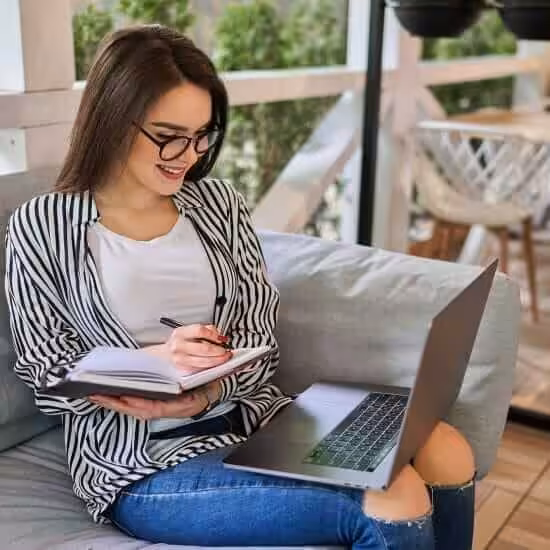 woman learning and Writing Dissertation Paper Essay