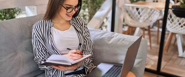 woman learning and Writing Dissertation Paper Essay