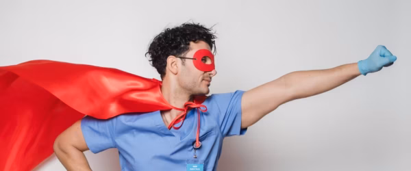 brave doctor in flying superhero cape with fist stretched