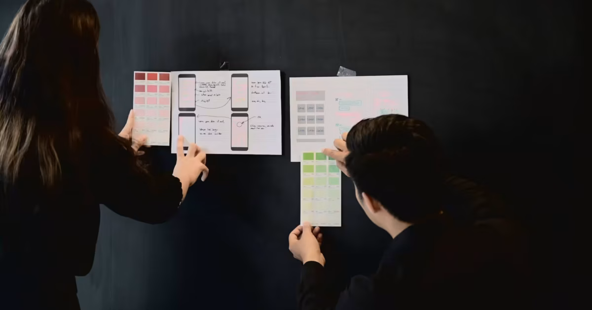 Designers collaborating on user interface mockups