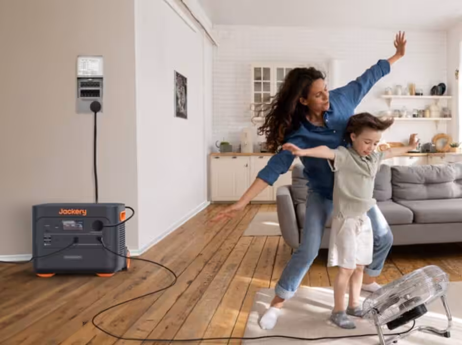 Mother and child dancing joyfully indoors.