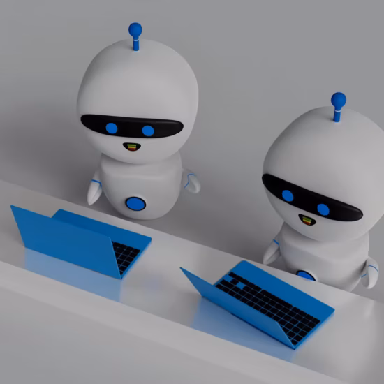 Two robots working on laptops