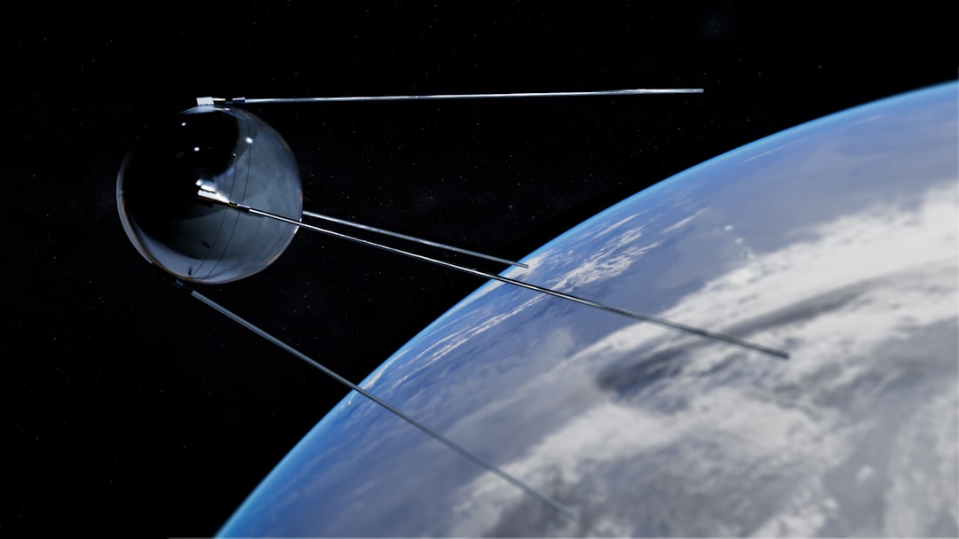 Satellite orbiting Earth in low Earth orbit with solar panels deployed