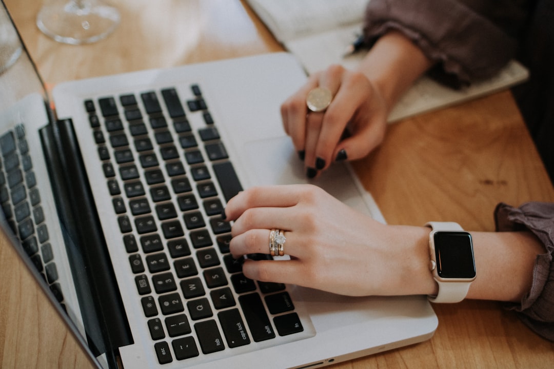Professional taking an online leadership course on a laptop
