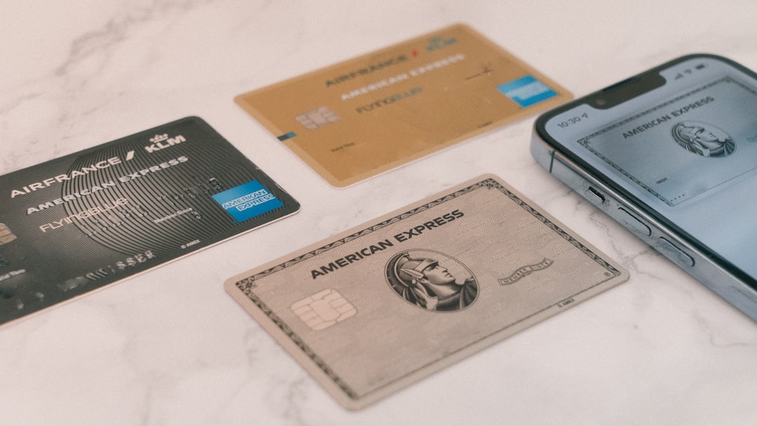 Stack of credit cards representing the debt cycle of revolving balances