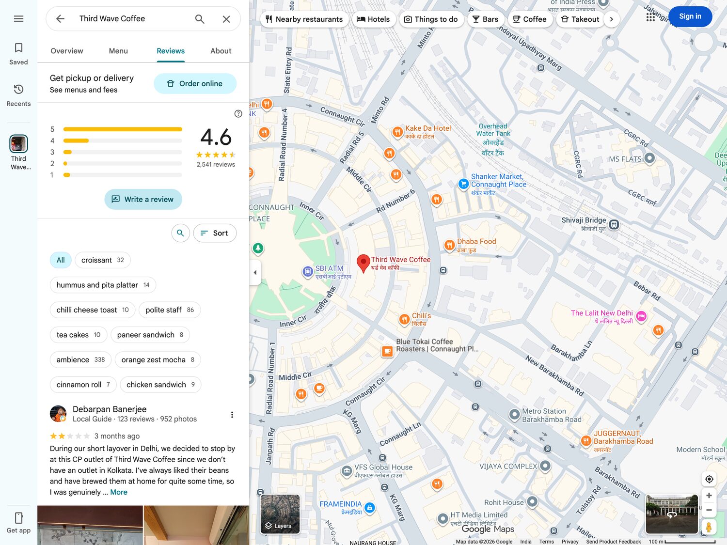 Reviews section of a Google Business Profile showing the rating breakdown and review topics