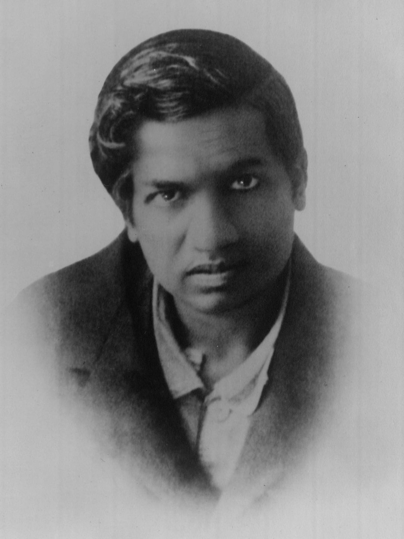 Srinivasa Ramanujan in a 1913 passport photograph