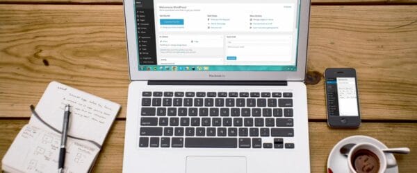 WordPress dashboard open on a laptop, the starting point for turning a plugin into a micro-SaaS business