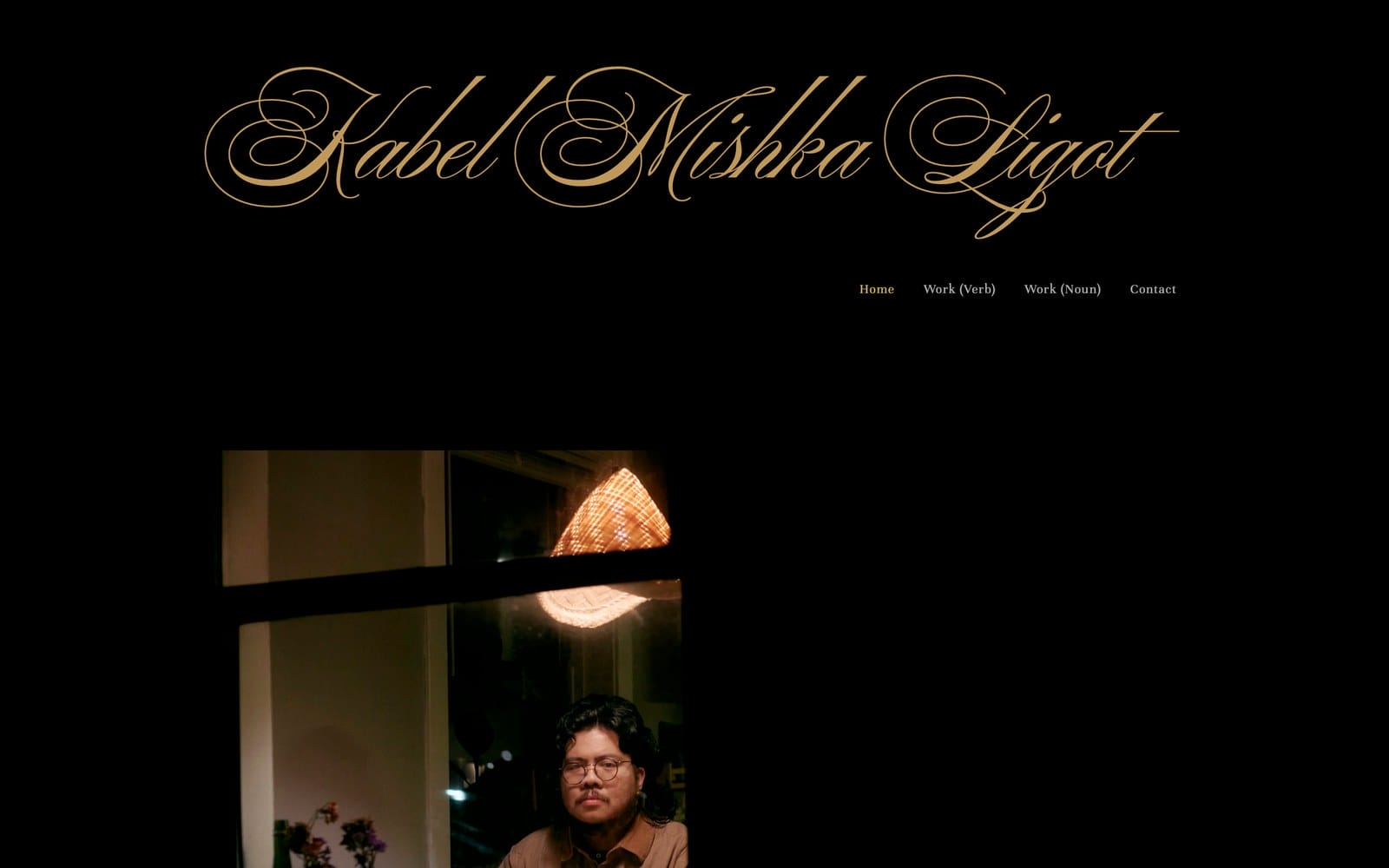 Kabel Mishka Ligot writing portfolio homepage with a calligraphic wordmark and navigation split into Work (Verb) and Work (Noun)