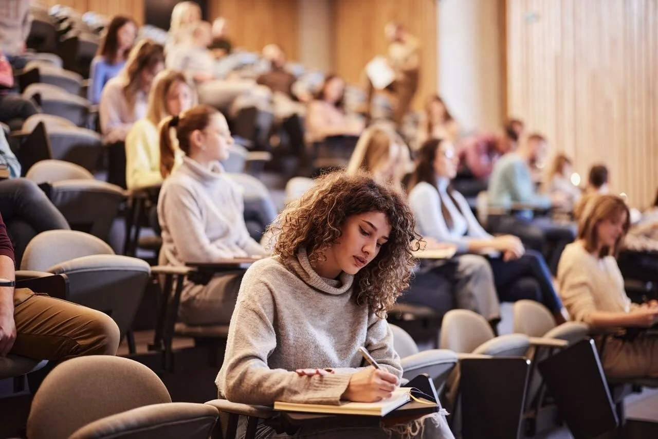 Official ProQuest One Academic image showing students in a university lecture