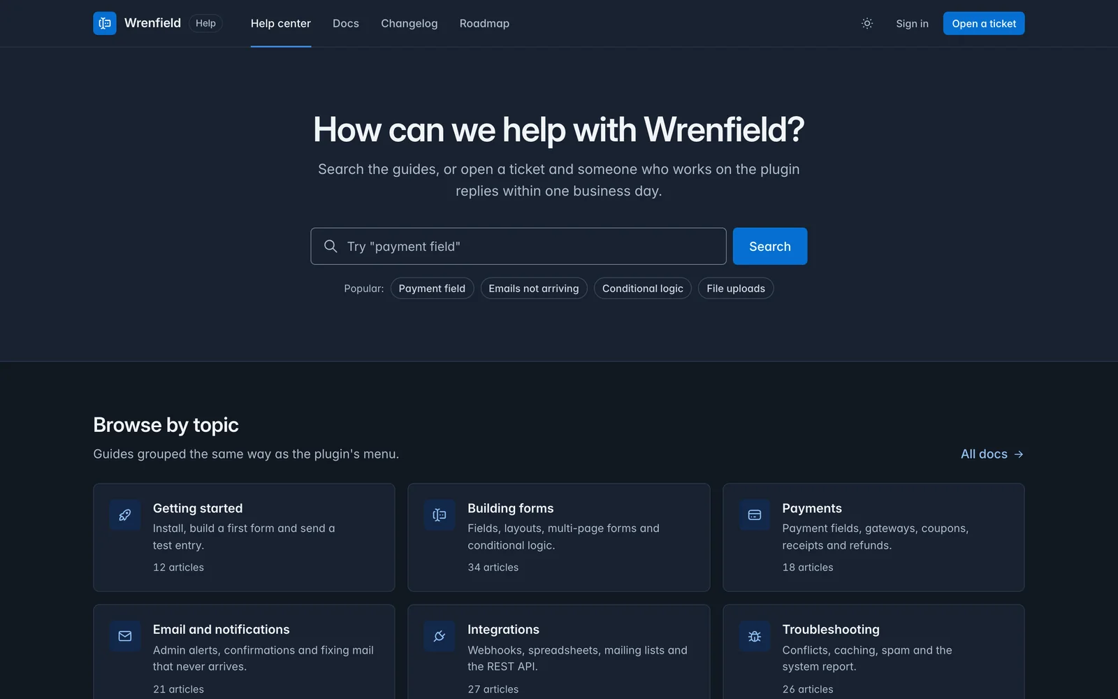 Core Support help center demo in dark mode, with the same search hero and topic cards on a dark slate canvas.