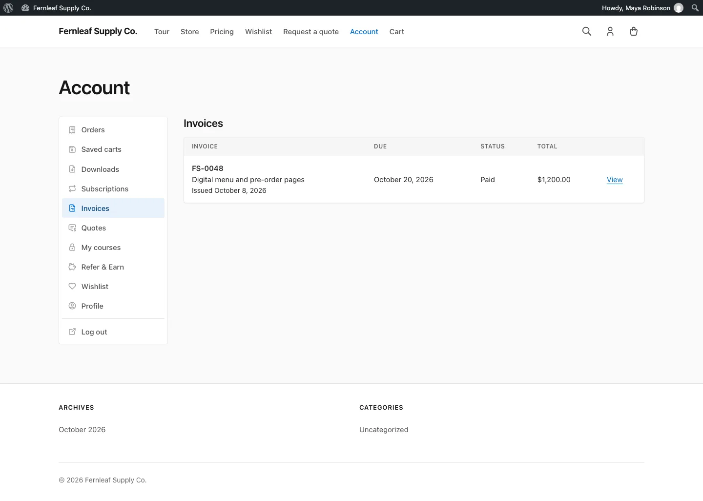 Easy Digital Downloads account page with the Stackless for EDD Invoices tab open, listing a paid invoice with its due date, status, total and a View link